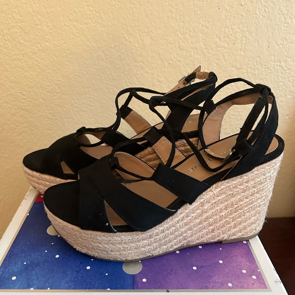 Size 5.5 espadrille, with black. Only worn a few times.